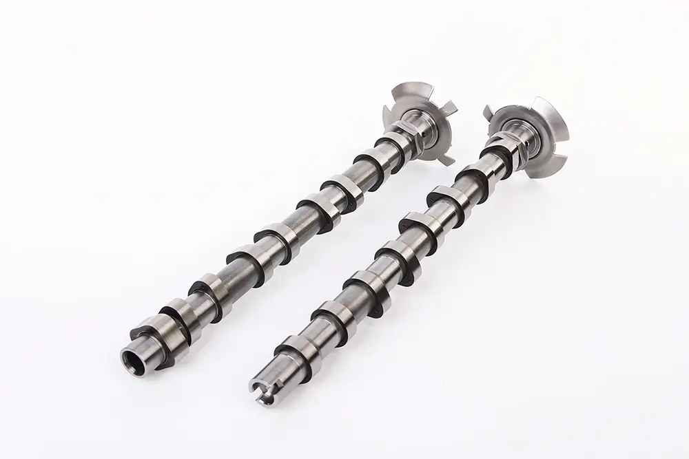 Intake and exhaust camshafts compared by overall structure, lobes, journals and end features