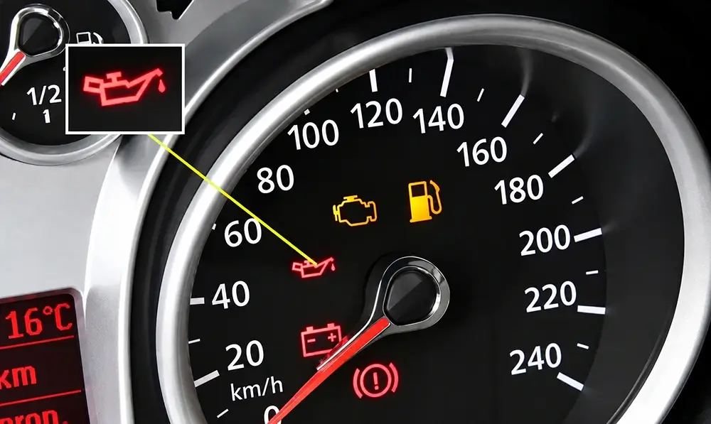 Red engine oil pressure warning light displayed on a vehicle dashboard